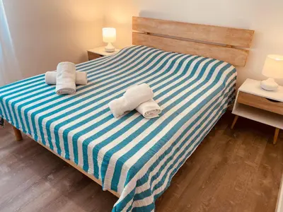 Letto o letti in una camera di Appartamento Cima - Vista Mare, 3 camere, WiFi, Family Apartment