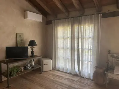 TV o dispositivi per l'intrattenimento presso Il Glicine - Natural BnB