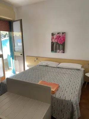 Letto o letti in una camera di Appartamenti Jesolo da Monica -Foscolo