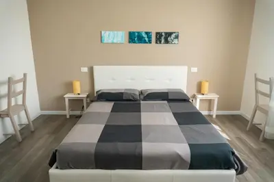Letto o letti in una camera di Casa Mirella