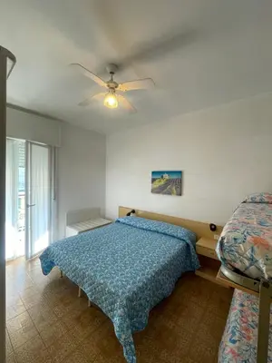 Letto o letti in una camera di FOSCOLO Sunset House