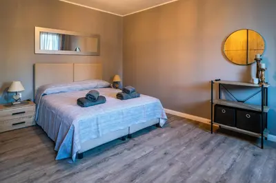 Letto o letti in una camera di Casa Enrico e Anna