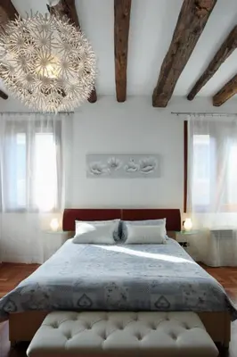 Letto o letti in una camera di Domus Biennale, Modern apartment in Venice centre.