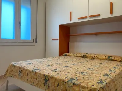 Letto o letti in una camera di Cozy apartment close to the beach