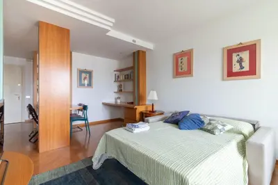 Letto o letti in una camera di Centralissimo con vista colline